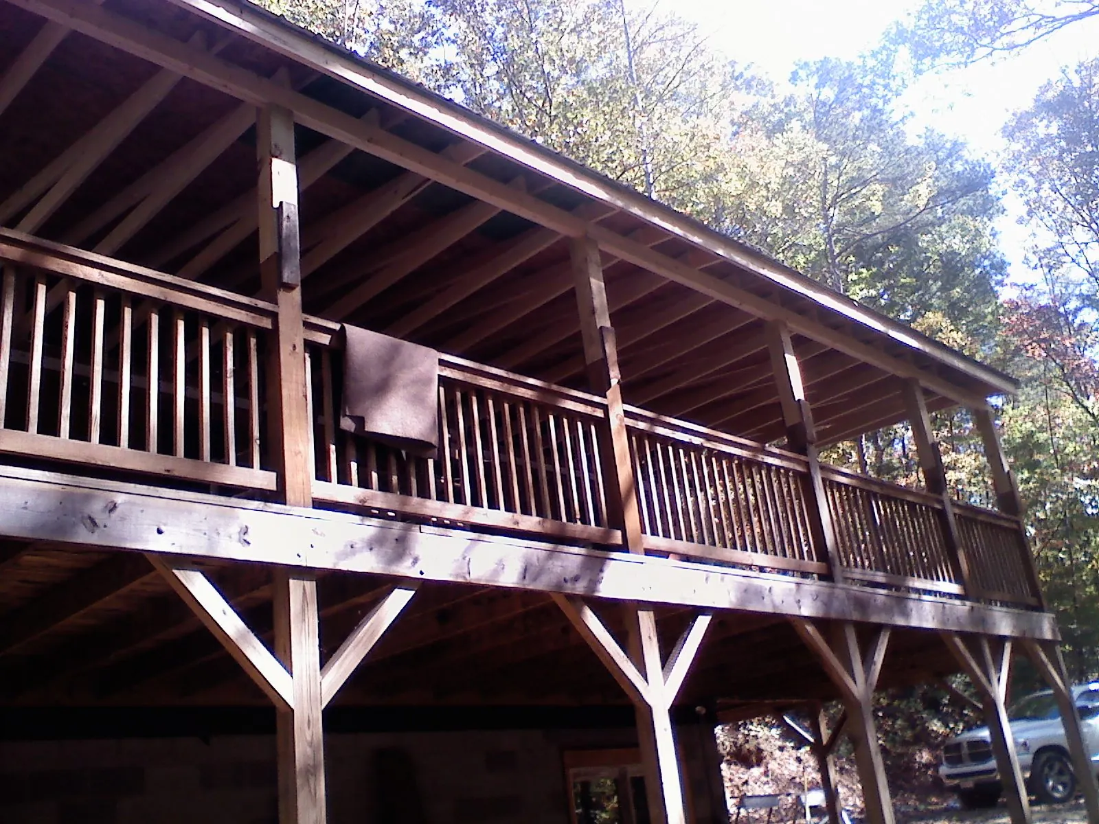 Timber framing under a new elevated porch and deck — Roof Leak Repair in Dolomite by Roofing Brothers